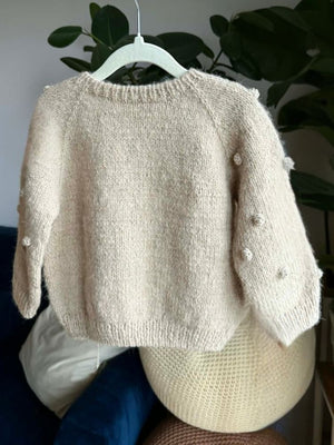 Beżowy kardigan dziecięcy w bąbelki no 1, dostępny od ręki 2-3 latka